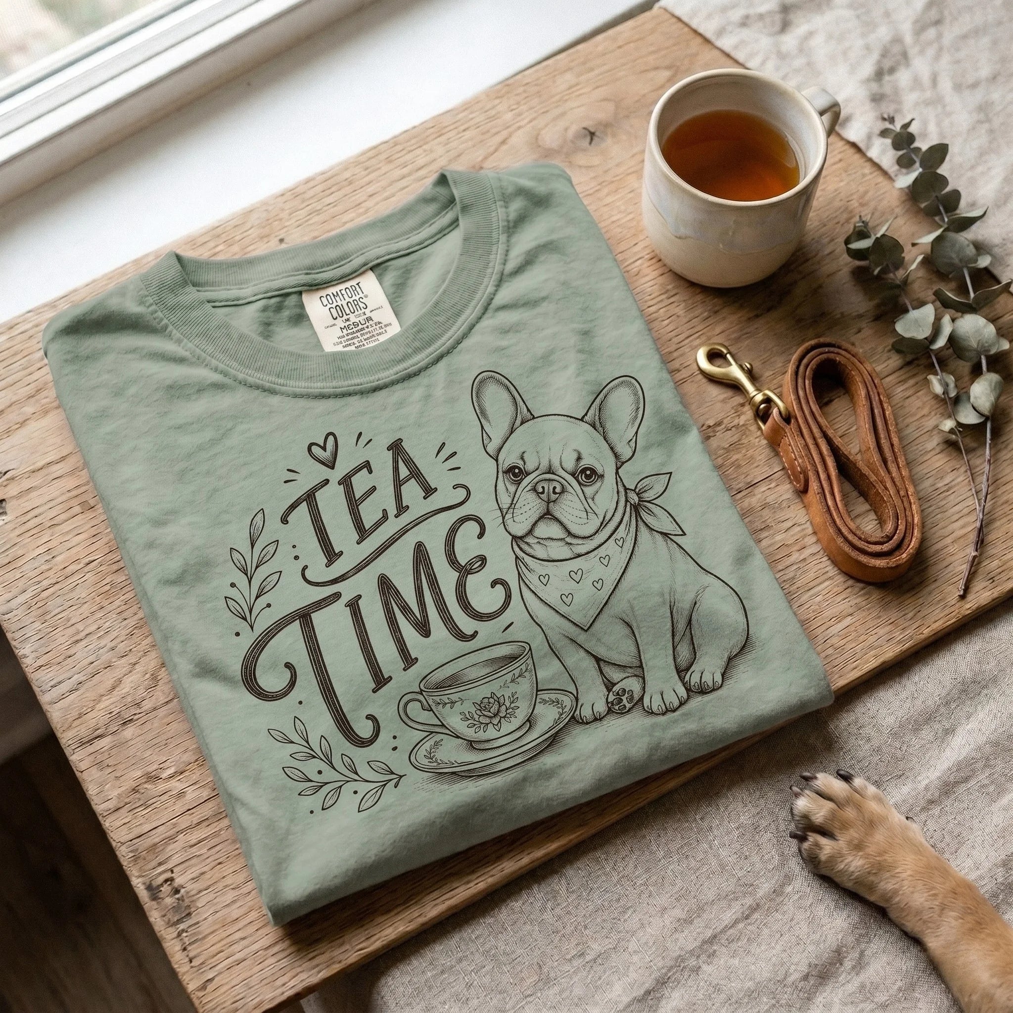 Comfort Colors garment-dyed t-shirt flat lay with Favourite Pawson props